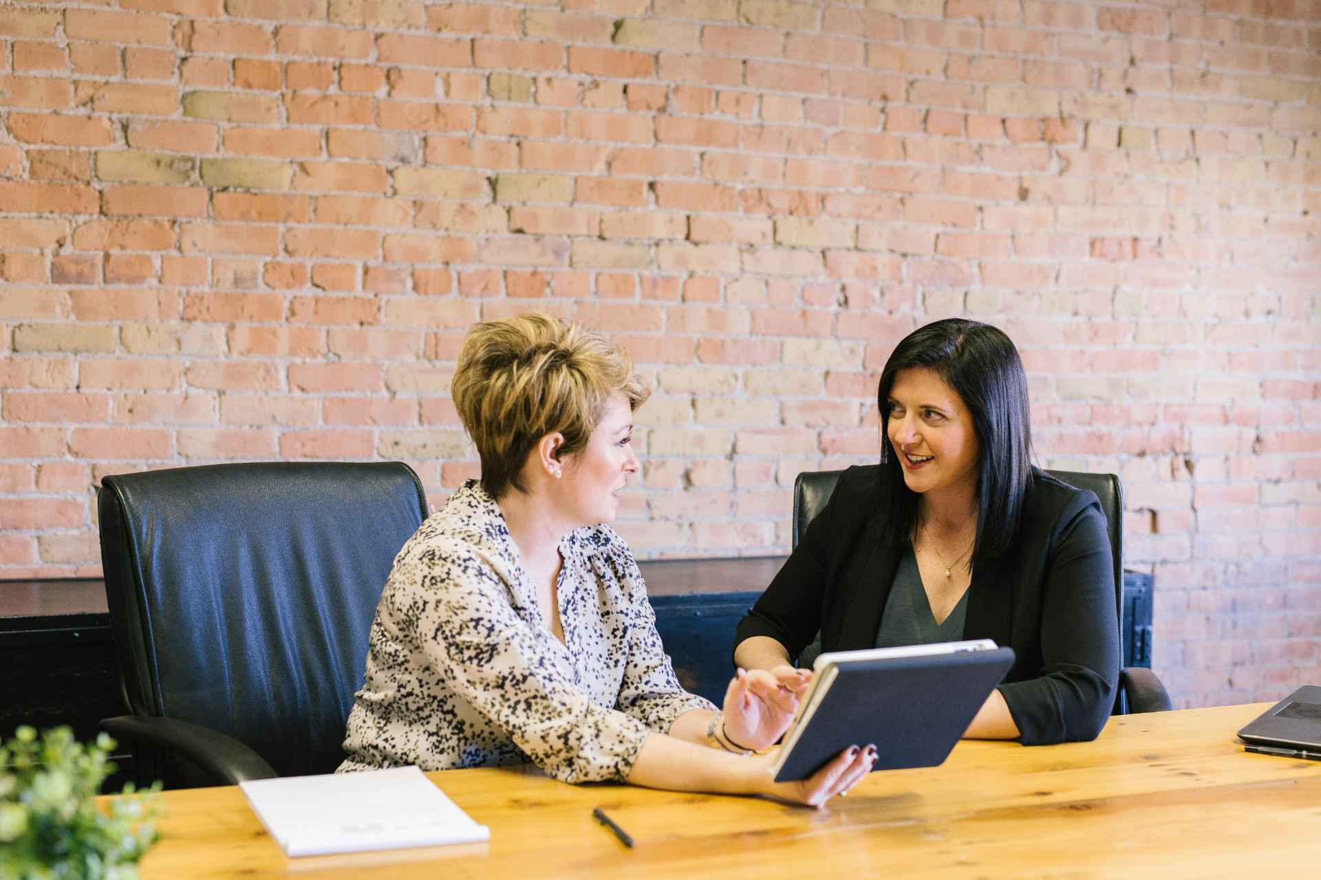 2 professional women meeting together